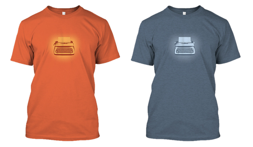 Two T-shirts, orange and grey, printed with a typewriter