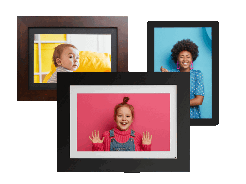 Three digital photo frames showing children’s portraits