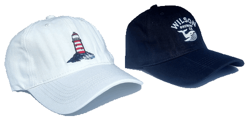 A white and a navy baseball cap