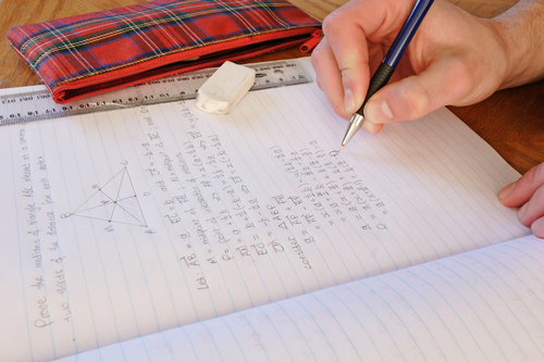 Illustration for a B2 conversation question about lessons, teachers and homework.