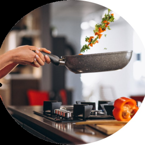 Cooking adventure: vegetables tossed in a frying pan